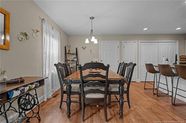 345 Pickett Cir, Vass, NC 28394 - dining area featuring light wood-style flooring, baseboards, and recessed lighting