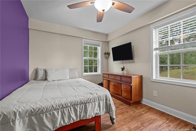 345 Pickett Cir, Vass, NC 28394 - bedroom featuring light wood-style floors, baseboards, and ceiling fan