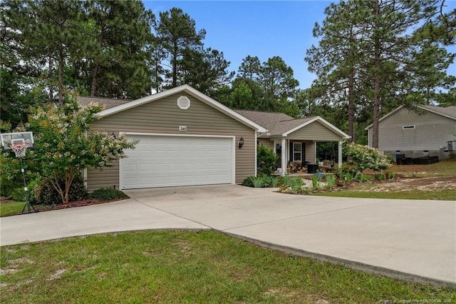345 Pickett Cir, Vass, NC 28394 - ranch-style house with driveway, an attached garage, and a porch