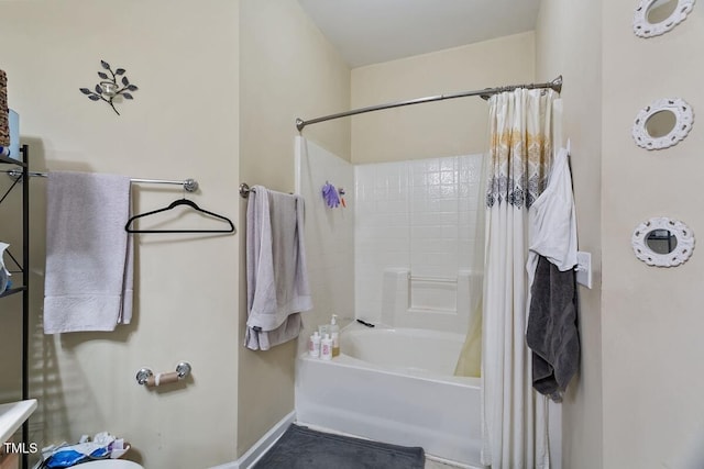 320 Madres Ln, Morrisville, NC 27560 - bathroom featuring shower / bath combination with curtain, baseboards, and toilet