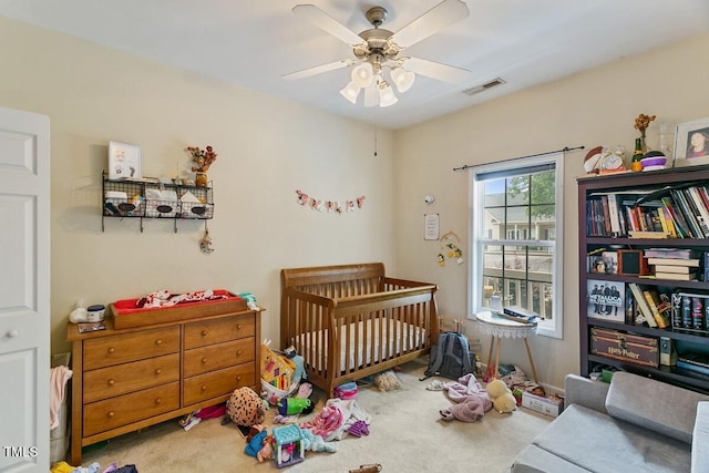 320 Madres Ln, Morrisville, NC 27560 - bedroom featuring a crib, carpet floors, and ceiling fan