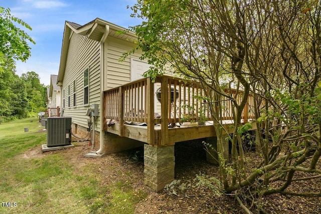 320 Madres Ln, Morrisville, NC 27560 - back of house featuring central AC unit, a wooden deck, and a yard