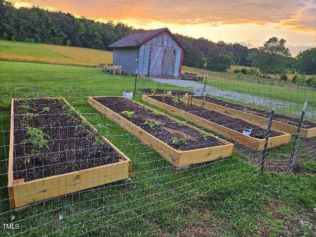 8365 Aaron Creek Church Rd, Oxford, NC 27565 - view of green lawn featuring a vegetable garden