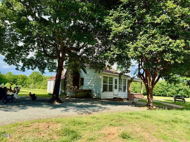 8365 Aaron Creek Church Rd, Oxford, NC 27565 - exterior space with a yard