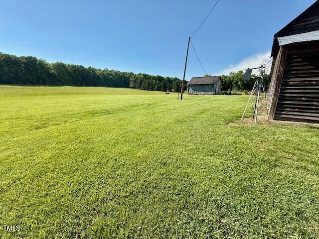 8365 Aaron Creek Church Rd, Oxford, NC 27565 - view of green lawn