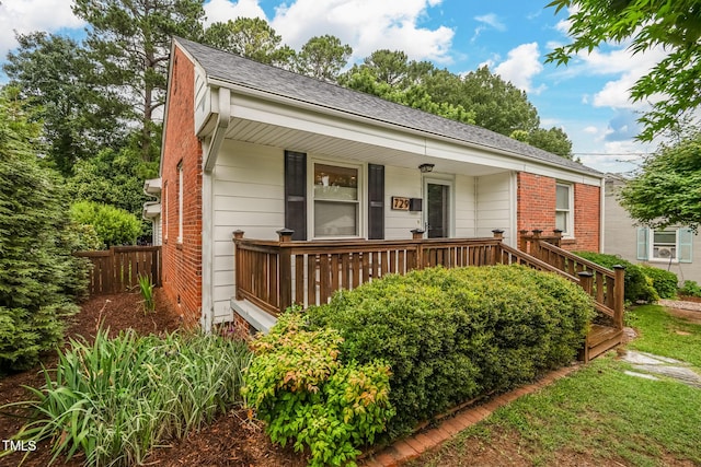 729 Mial St, Raleigh, NC 27608 - bungalow-style home featuring brick siding, roof with shingles, and covered porch