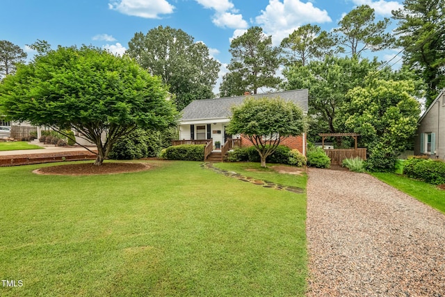 729 Mial St, Raleigh, NC 27608 - view of property hidden behind natural elements with driveway and a chimney