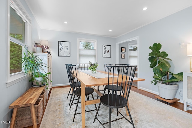 729 Mial St, Raleigh, NC 27608 - dining area featuring light wood-style flooring, recessed lighting, ornamental molding, and baseboards