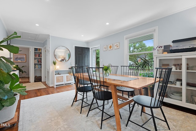 729 Mial St, Raleigh, NC 27608 - dining room featuring attic access, wood finished floors, ornamental molding, and recessed lighting