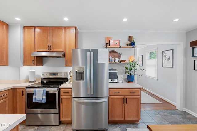 729 Mial St, Raleigh, NC 27608 - kitchen featuring appliances with stainless steel finishes, under cabinet range hood, light countertops, crown molding, and recessed lighting