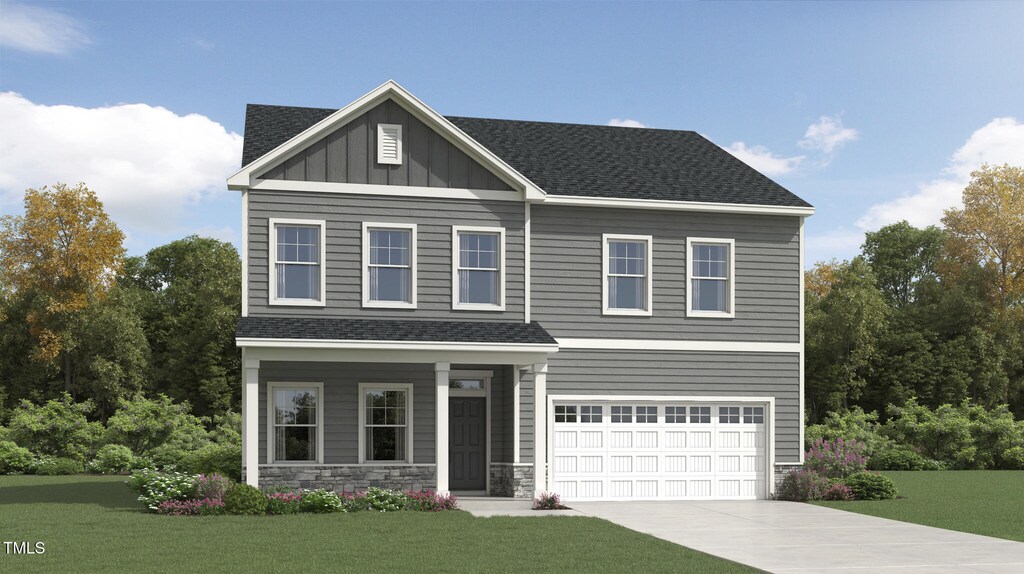 1203 Cosmic Dr, Durham, NC 27703 - craftsman-style home featuring a front lawn, a shingled roof, driveway, and an attached garage