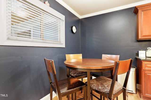 2805 Friendship Rd, Durham, NC 27705 - dining area featuring crown molding and light wood-style flooring