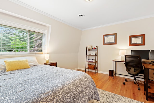 2805 Friendship Rd, Durham, NC 27705 - bedroom with wood finished floors, ornamental molding, baseboards, and a desk