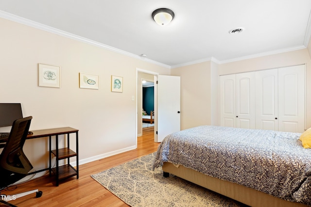2805 Friendship Rd, Durham, NC 27705 - bedroom with ornamental molding, light wood finished floors, baseboards, a closet, and an office area