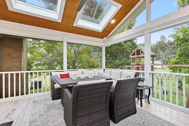 2805 Friendship Rd, Durham, NC 27705 - sunroom / solarium featuring wooden ceiling, a skylight, lofted ceiling, healthy amount of natural light, and outdoor dining space