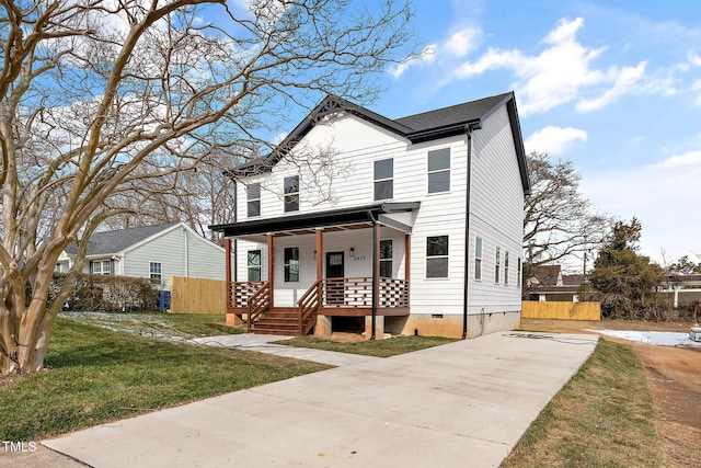 2517 Newbold St, Raleigh, NC 27603 - view of front facade featuring covered porch, driveway, and crawl space