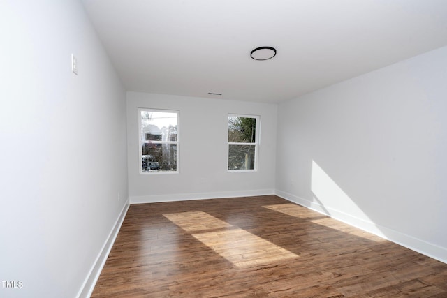 2517 Newbold St, Raleigh, NC 27603 - unfurnished room featuring wood finished floors and baseboards