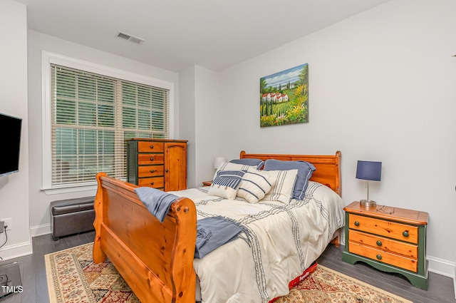 352 Fire Opal Ln, Holly Springs, NC 27540 - bedroom with wood finished floors and baseboards