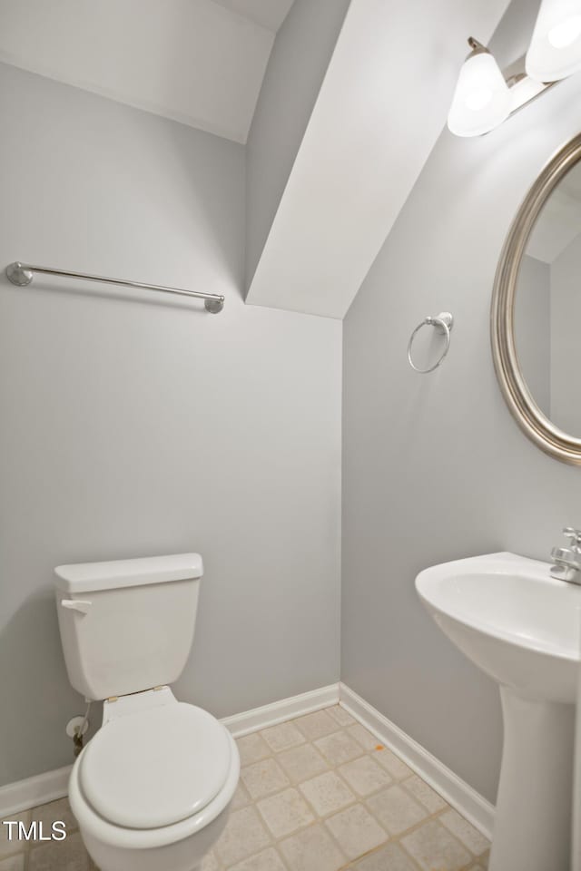 106 Gumdrop Path, Apex, NC 27502 - half bath with toilet, baseboards, tile patterned floors, and a sink