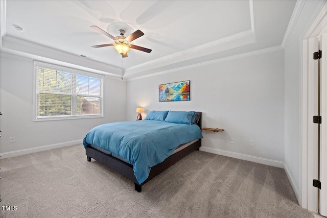 247 Axis Deer Ln, Garner, NC 27529 - carpeted bedroom featuring a raised ceiling, crown molding, baseboards, and ceiling fan