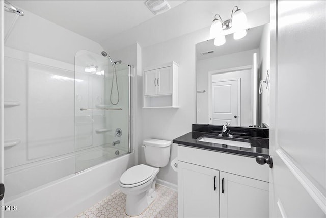 247 Axis Deer Ln, Garner, NC 27529 - bathroom with vanity, toilet, shower / bath combination with glass door, and baseboards