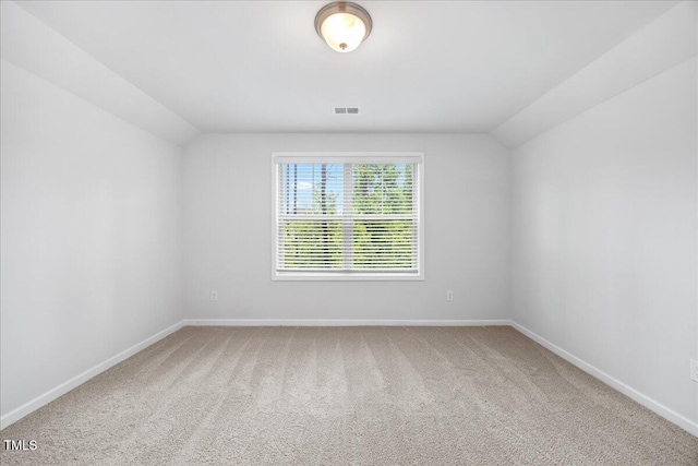 247 Axis Deer Ln, Garner, NC 27529 - carpeted spare room featuring vaulted ceiling and baseboards