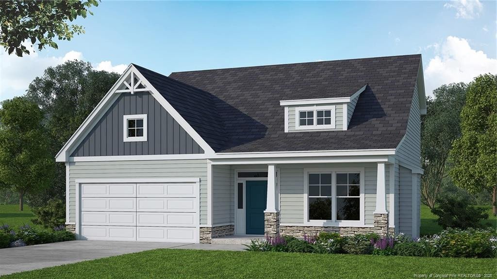 657 Southerland Peak Dr, Raeford, NC 28376 - view of front of property featuring stone siding, a front lawn, concrete driveway, and covered porch