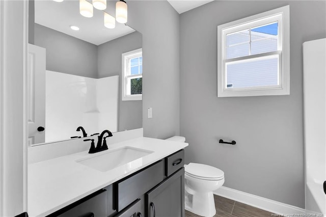 91 Laramie Ln, Selma, NC 27576 - full bath with vanity, baseboards, toilet, a shower, and a bath