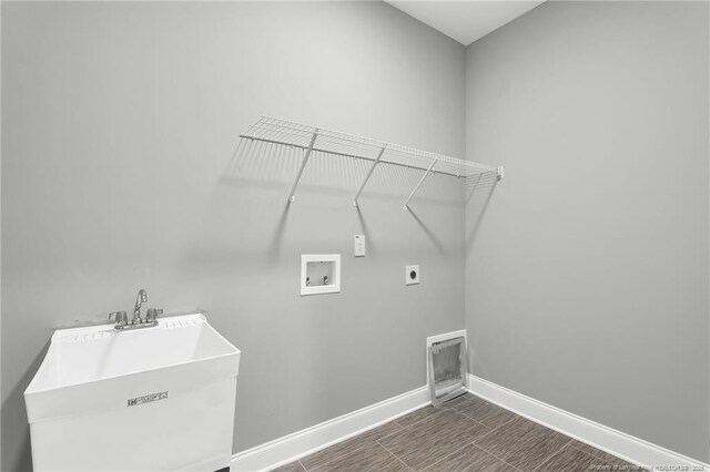 91 Laramie Ln, Selma, NC 27576 - washroom with hookup for an electric dryer, washer hookup, and baseboards