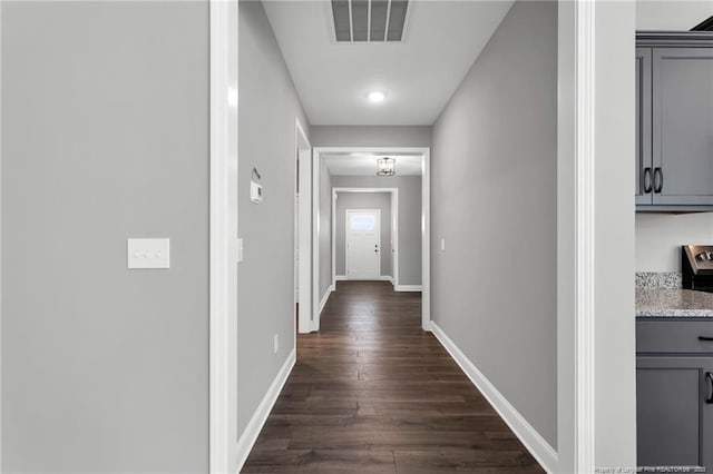 91 Laramie Ln, Selma, NC 27576 - hall with dark wood-style flooring and baseboards
