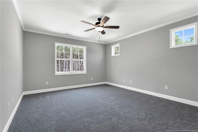 91 Laramie Ln, Selma, NC 27576 - empty room featuring ceiling fan, ornamental molding, dark colored carpet, and baseboards