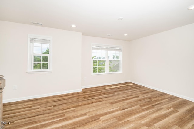 2619 Bordwell Grant Dr, New Hill, NC 27562 - spare room featuring light wood-style floors, baseboards, and recessed lighting