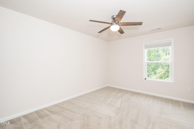 2619 Bordwell Grant Dr, New Hill, NC 27562 - empty room with baseboards, a ceiling fan, and light carpet