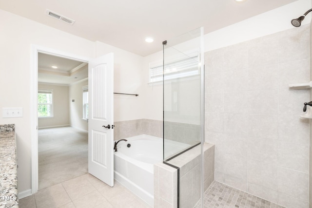 2619 Bordwell Grant Dr, New Hill, NC 27562 - bathroom with tiled shower, a bath, tile patterned flooring, crown molding, and recessed lighting
