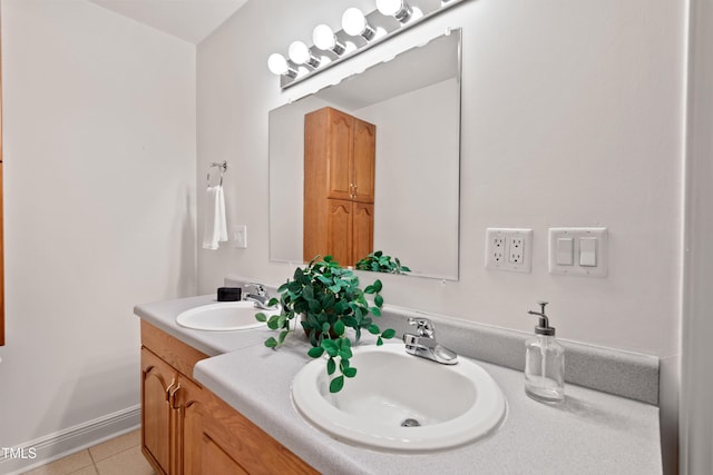 307 Country Club Dr, Durham, NC 27712 - bathroom with double vanity and tile patterned flooring