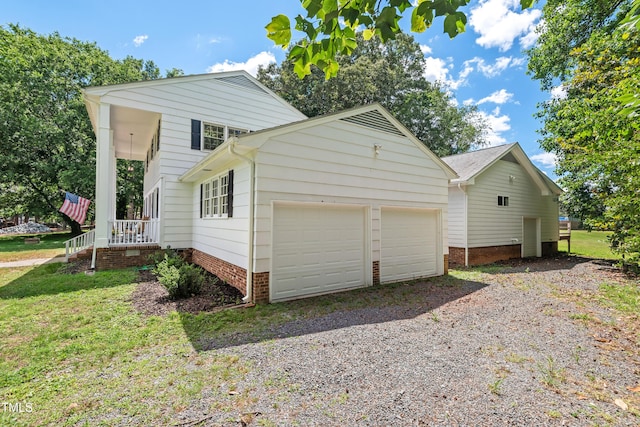 307 Country Club Dr, Durham, NC 27712 - view of property exterior with a lawn, an attached garage, and driveway