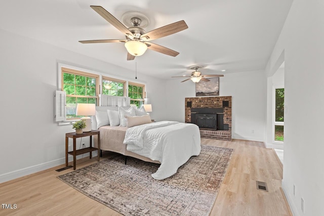 307 Country Club Dr, Durham, NC 27712 - bedroom featuring light wood-style flooring, baseboards, and a ceiling fan