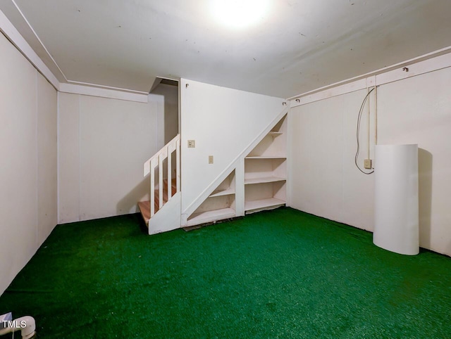 307 Country Club Dr, Durham, NC 27712 - finished below grade area with carpet floors and stairway