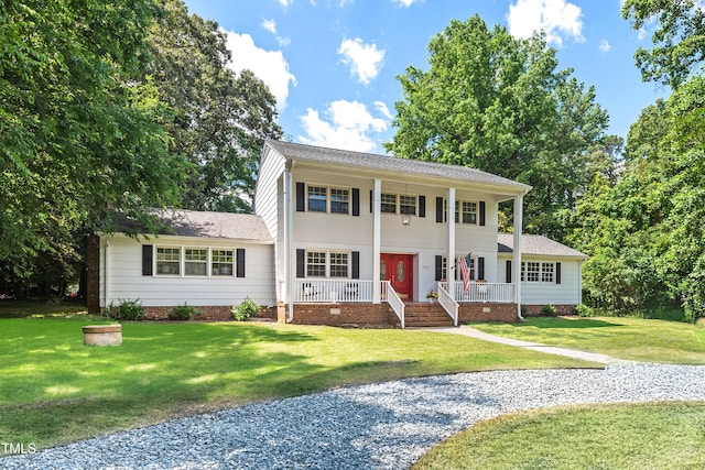 307 Country Club Dr, Durham, NC 27712 - neoclassical home featuring covered porch, a front lawn, and crawl space