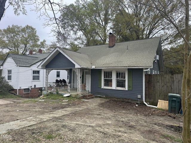 2503 Chapel Hill Rd, Durham, NC 27707 - view of front facade featuring a porch, a chimney, and a shingled roof