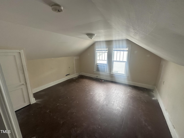 2503 Chapel Hill Rd, Durham, NC 27707 - additional living space featuring vaulted ceiling and baseboards