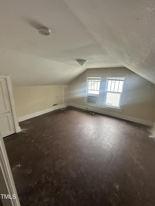 2503 Chapel Hill Rd, Durham, NC 27707 - additional living space featuring baseboards and vaulted ceiling