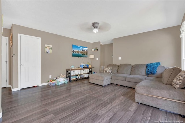 2251 Hackney Loop, Fayetteville, NC 28304 - living room with a ceiling fan, wood finished floors, and baseboards
