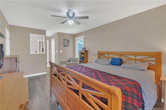 2251 Hackney Loop, Fayetteville, NC 28304 - bedroom featuring wood finished floors, baseboards, and ceiling fan