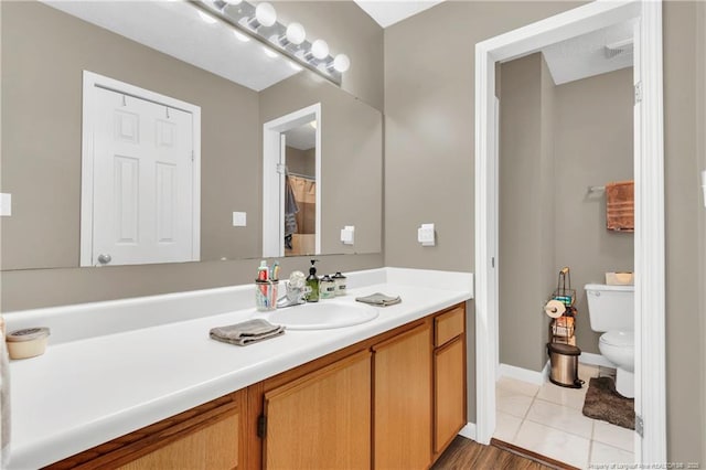 2251 Hackney Loop, Fayetteville, NC 28304 - full bathroom with vanity, toilet, and tile patterned floors