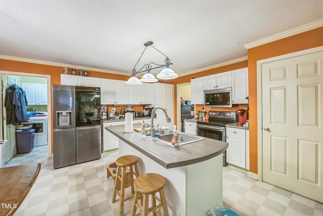 115 Redbay Ln, Clayton, NC 27527 - kitchen featuring appliances with stainless steel finishes, light floors, washer / dryer, a sink, and ornamental molding