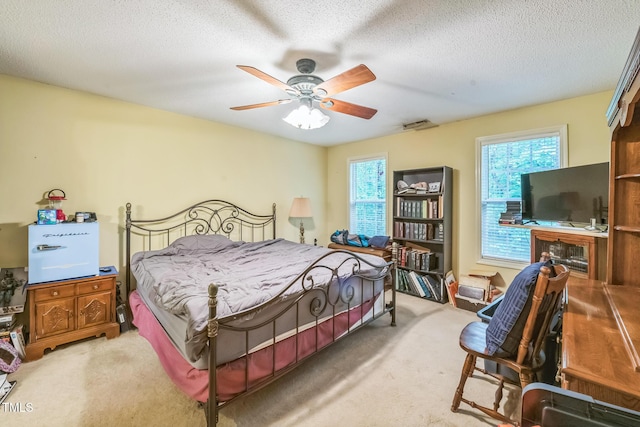 115 Redbay Ln, Clayton, NC 27527 - bedroom featuring carpet floors, a textured ceiling, and ceiling fan