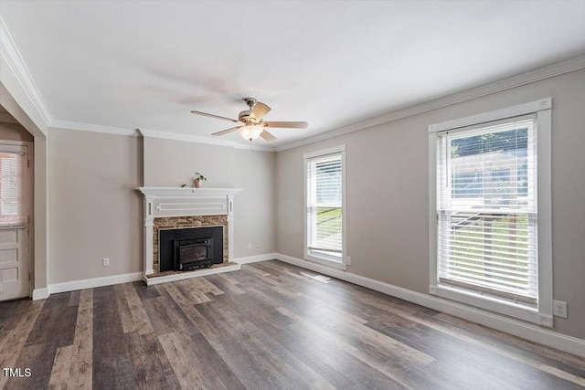 111 Mcdole Cir, Cary, NC 27511 - unfurnished living room with wood finished floors, a ceiling fan, crown molding, and baseboards