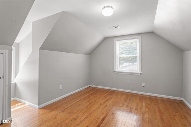 111 Mcdole Cir, Cary, NC 27511 - additional living space with light wood-type flooring, baseboards, and lofted ceiling
