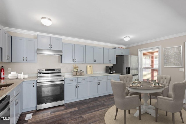 111 Mcdole Cir, Cary, NC 27511 - kitchen with appliances with stainless steel finishes, crown molding, under cabinet range hood, dark wood-style floors, and light stone countertops